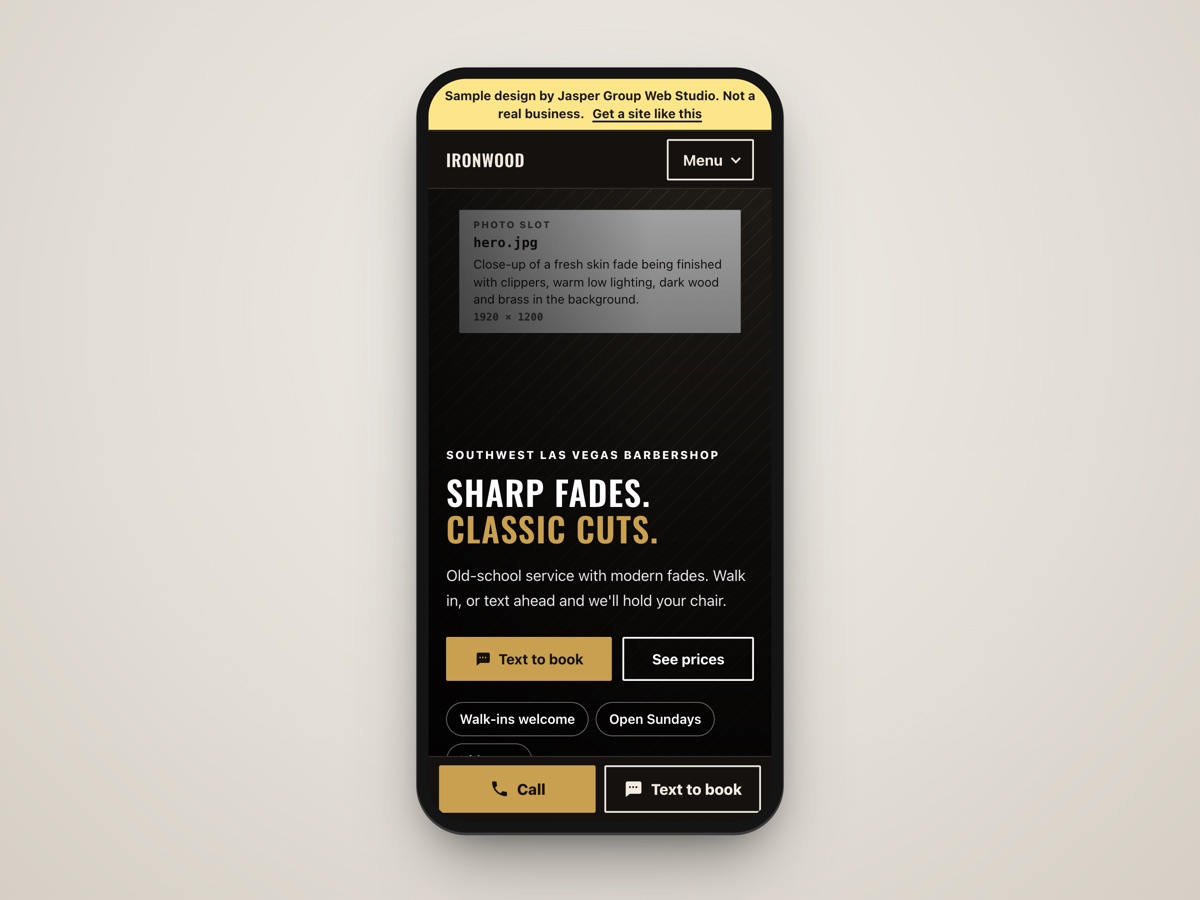 Phone showing the Ironwood Barber Parlor sample website