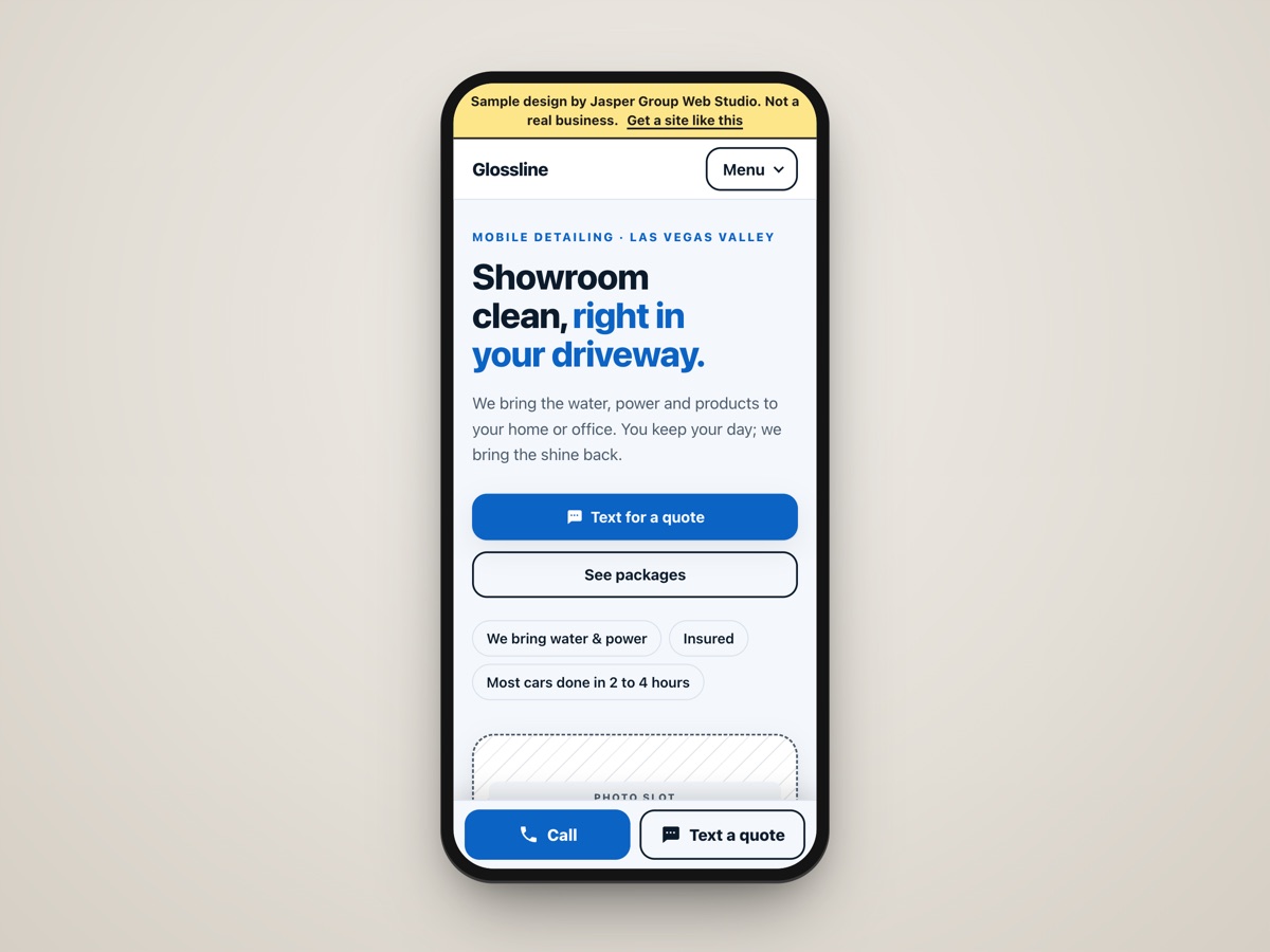 Phone showing the Glossline Mobile Detailing sample website